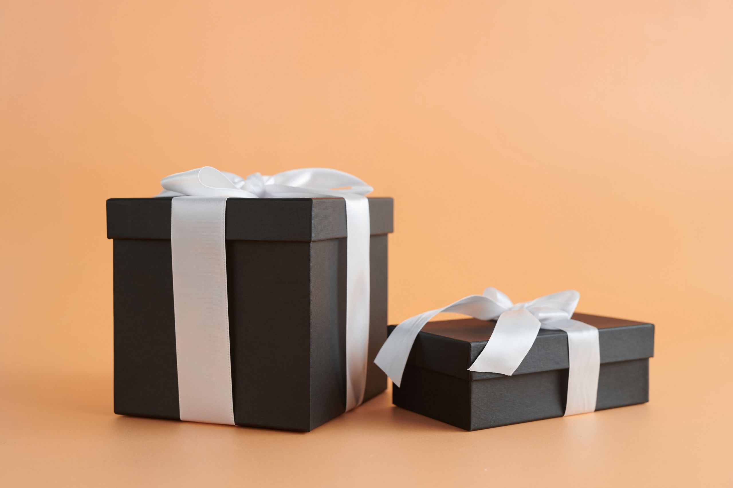 Gift box with ribbon and cheese